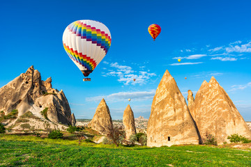 Fototapeta na wymiar The great tourist attraction of Cappadocia - balloon flight. Cappadocia is known around the world as one of the best places to fly with hot air balloons. Goreme, Cappadocia, Turkey