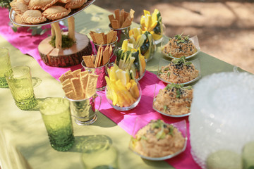 Festive wedding table, decorated with sweets and drinks