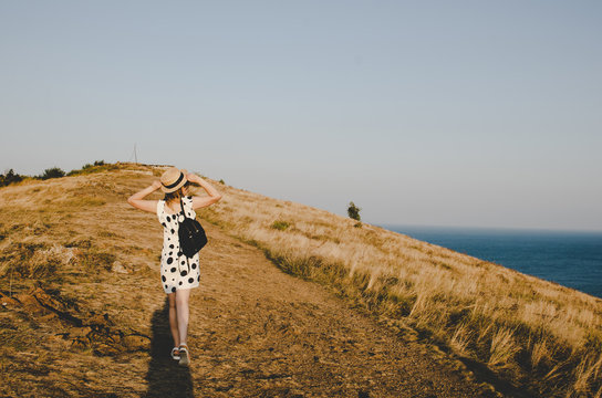 young woman walking in Sevan island