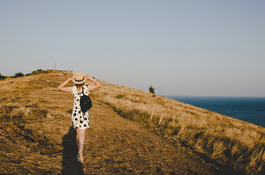 young woman walking in Sevan island