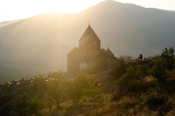 old Sevanavanq monastery in Sevan, Armenia while sunset