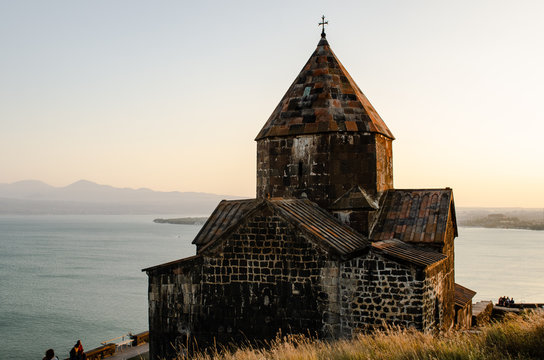 old Sevanavanq monastery in Sevan, Armenia while sunset