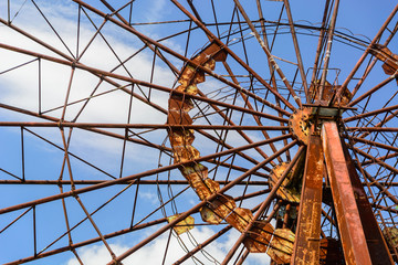 Obraz premium The ferris wheel of Pripyat, Ukraine 2019. Blue sky and white cloud.