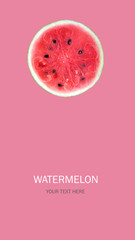 Half watermelon on pink background with copy space, summer fruit top view