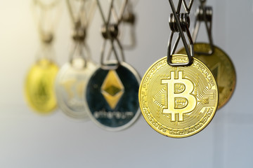 Money Laundering. Bitcoin coins hanging on clotheslines. Money Laundering Bitcoin coins hung out to dry.