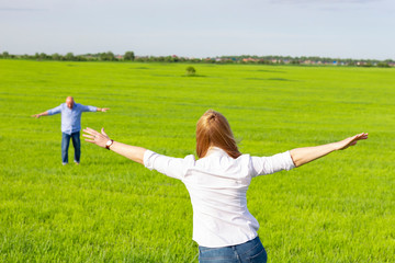  Married couple fooling around on the lawn