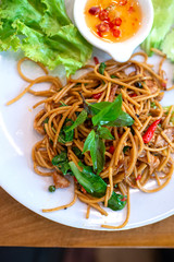 Drunken spaghetti in a white dish