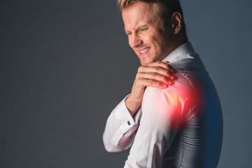 stress caucasian businessman officer feel bad with work hard and office syndrome hand touch painful body part