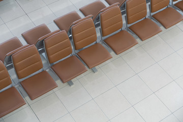 Fototapeta premium Seats inside the passenger hall at the Airport is empty space.