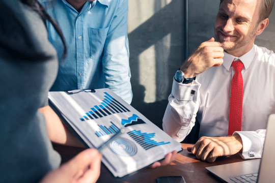 Successful Business Meeting Caucasian Businessman Manager White Shirt Red Tie Enjoy With Result Of Profit From Chart Graph With Co Worker Office Background