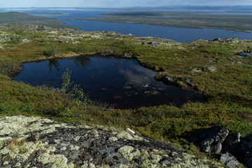 Naklejka na ściany i meble Lake in the highland tundra