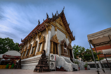 A golden tall Buddha standing at wat Intharawihan.This 32 metre high and 10 feet wide Buddha is the biggest of its kind in the world. Wat Intharawihan is on wisut Kasat road Bangkok Thailand.