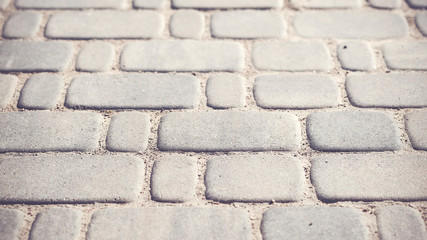 Gray оval paving piles. background