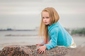 girl in a blue sweater