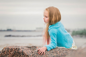 girl in a blue sweater