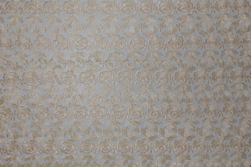 Beautiful white fabric with floral pattern and textile texture background