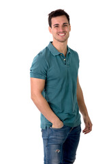 Fototapeta premium Handsome young man in green shirt and jeans posing isolated on white background in studio,