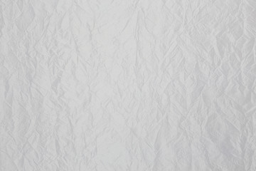 Elegant white shiny fabric with  corrugated fabric texture