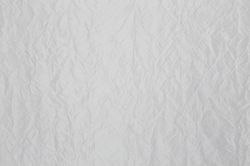 Elegant white shiny fabric with  corrugated fabric texture