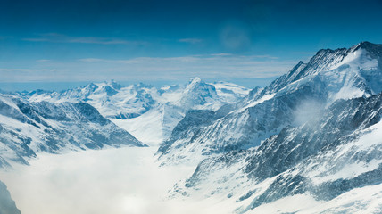 Fototapeta na wymiar Aletsch Glacier/Fletsch Glacier. Panoramic view part of Swiss Alps alpine snow mountains landscape from Top of Europe at Jungfraujoch station, Switzerland