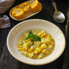 soup with corn and vegetables (first course). top food background. copy space