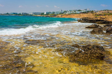  Panoramic view of Ayia Napa coast, Cyprus with blue sea and yellow-black rocks