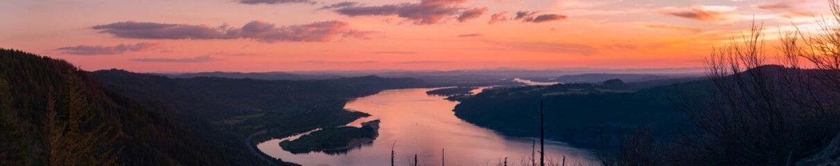 Panoramic image of summer sunset over the Columbia River Gorge from Angels Rest, Oregon