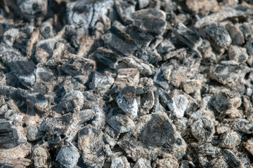 The texture of hot ash, gray, on the, grill