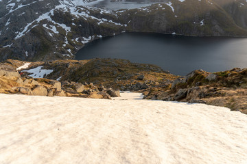 Snow on top of a hill a beautiful day in Lofoten Norway