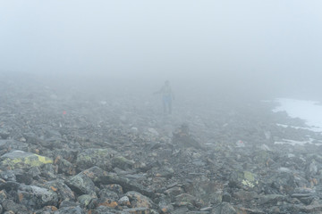 Person hiking in snow storm. Kebnekaise Sweden