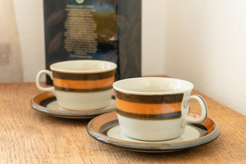 Coffee cups on a wooden table
