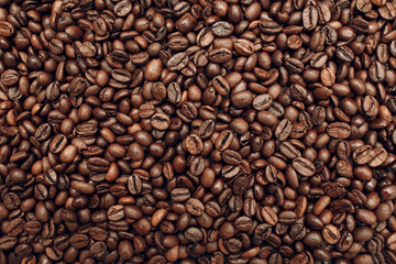Fototapeta premium Palone ziarna kawy brązowe nasiona tekstura tło tapeta.