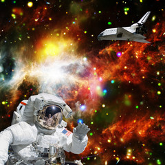 Fototapeta na wymiar Astronaut in outer space. Shuttle on the backdrop. The elements of this image furnished by NASA.