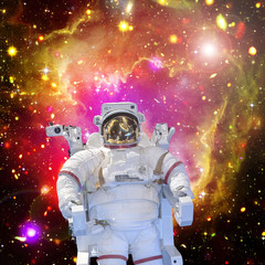 Astronaut and space, galaxies and stars. The elements of this image furnished by NASA.