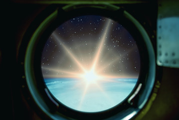 Sunrise, view from spaceship. Elements of this image furnished by NASA.