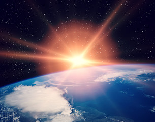 Earth from space during a sunrise. The elements of this image furnished by NASA.