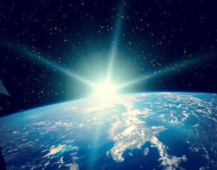 Planet earth and fascinating sunrise. The elements of this image furnished by NASA.