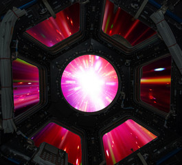 Hyper jump in in window of spaceship. Elements of this image furnished by NASA.