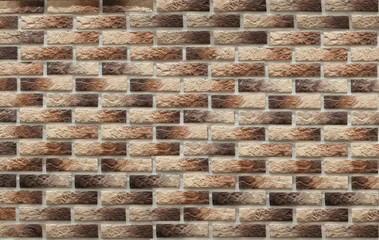Background of masonry brown clinker bricks on the wall, which are used in the repair of premises