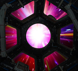 Hyper jump in in window of spaceship. Elements of this image furnished by NASA.