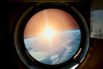 Sunrise, view from spaceship. Elements of this image furnished by NASA.