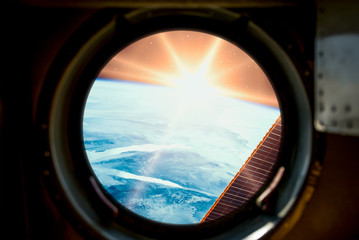 Sunrise, view from spaceship. Elements of this image furnished by NASA.