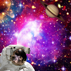 Obraz na płótnie Canvas Astronaut looking at the planet against space. The elements of this image furnished by NASA.