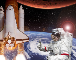 Rocket flies from earth to Mars. Astronaut shows the thumbs-up. Big sun.  The elements of this image furnished by NASA.