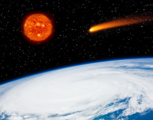 Earth, burning sun and flying comet. The elements of this image furnished by NASA.