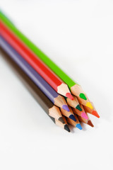 colorful wooden pencils for drawing on white background