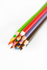 colorful wooden pencils for drawing on white background