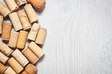 stack of corks on a withe table background