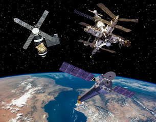 Satellite and spaceships. The elements of this image furnished by NASA.