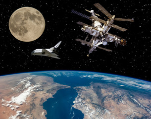 Shuttle goes from earth to moon. The elements of this image furnished by NASA.